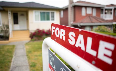 Real estate market notches downward amid climbing interest rates, association says